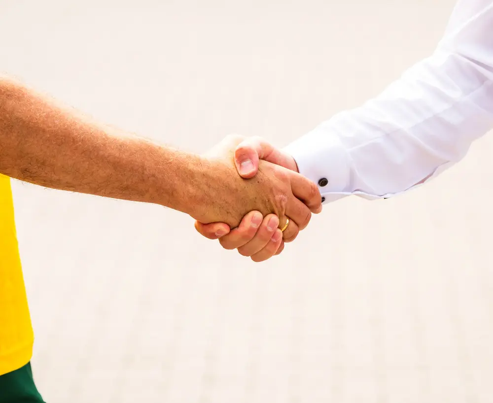 Partnerschaftlicher Händedruck