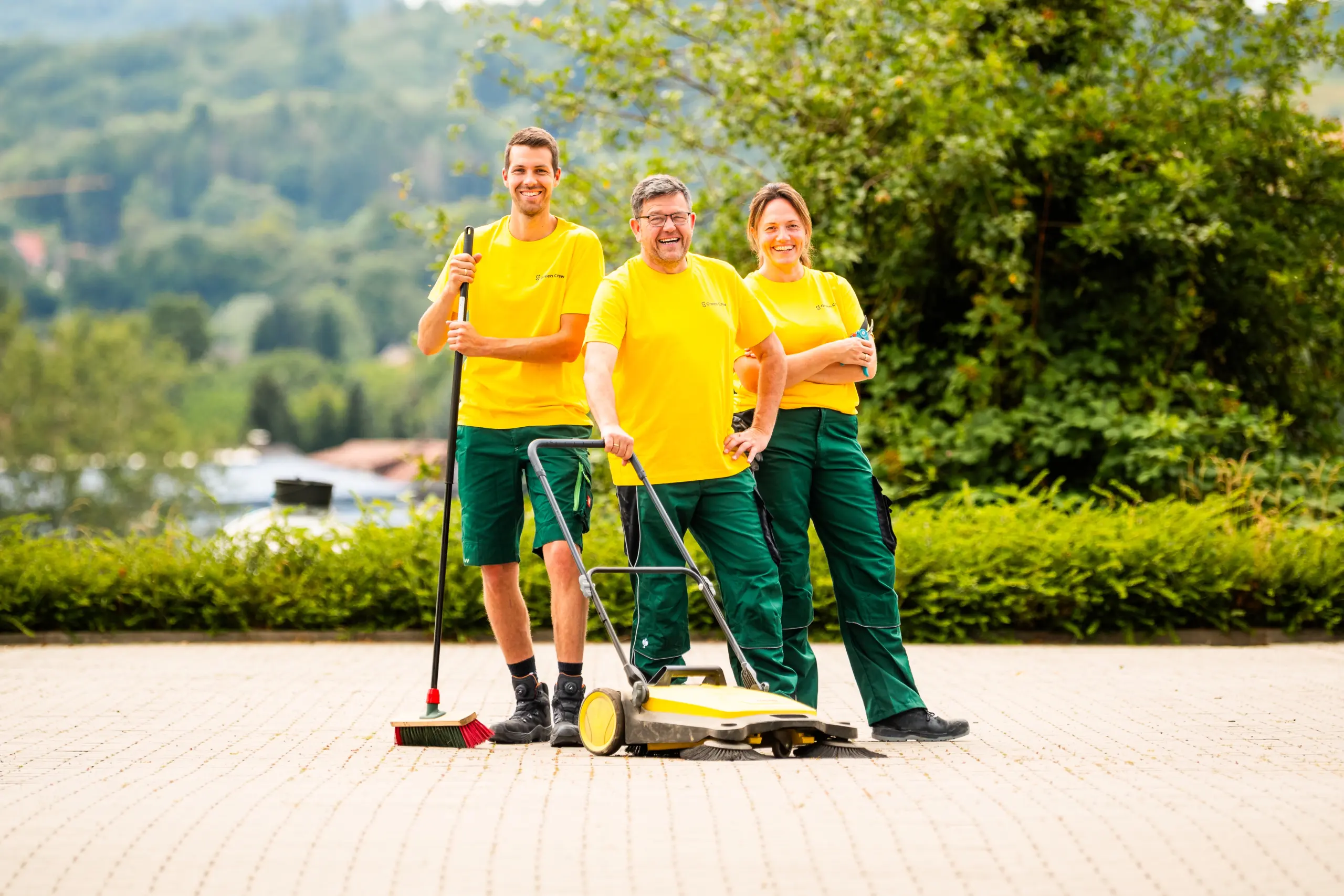 Lächelnde Green Crew Mitarbeiter